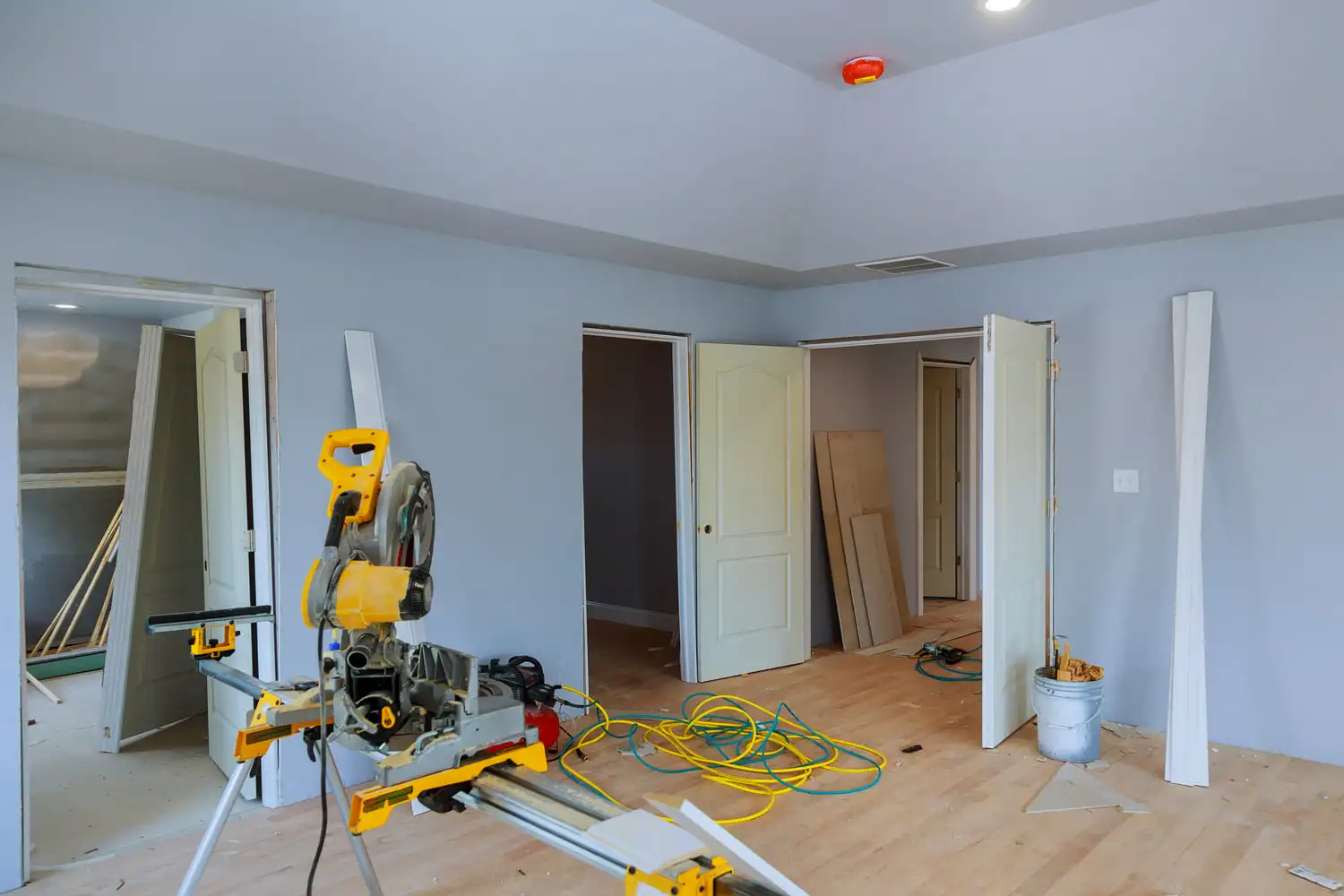 Expert residential renovation services in Dubai by RCi Red Chillies Interiors LLC, showcasing an in-progress home renovation with tools, construction materials, and partially installed fixtures